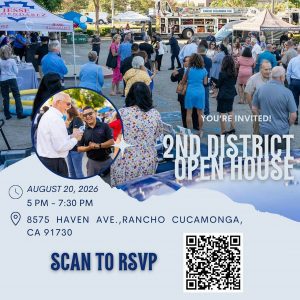 Promotional graphic for the 4th Annual 2nd District Open House. A large photo shows community members visiting booths and talking with County staff at an outdoor event, with a fire engine and vendor tents in the background. A circular inset photo shows Supervisor Jesse Armendarez speaking with an attendee. Text reads: "You're Invited! 2nd District Open House." Event details: August 20, 2026, 5:00–7:30 p.m., 8575 Haven Ave., Rancho Cucamonga, CA 91730. A QR code and the words "Scan to RSVP" appear at the bottom.